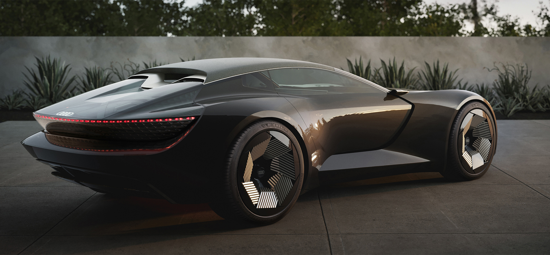 Audi skysphere roadster with closed roof viewed diagonally from behind