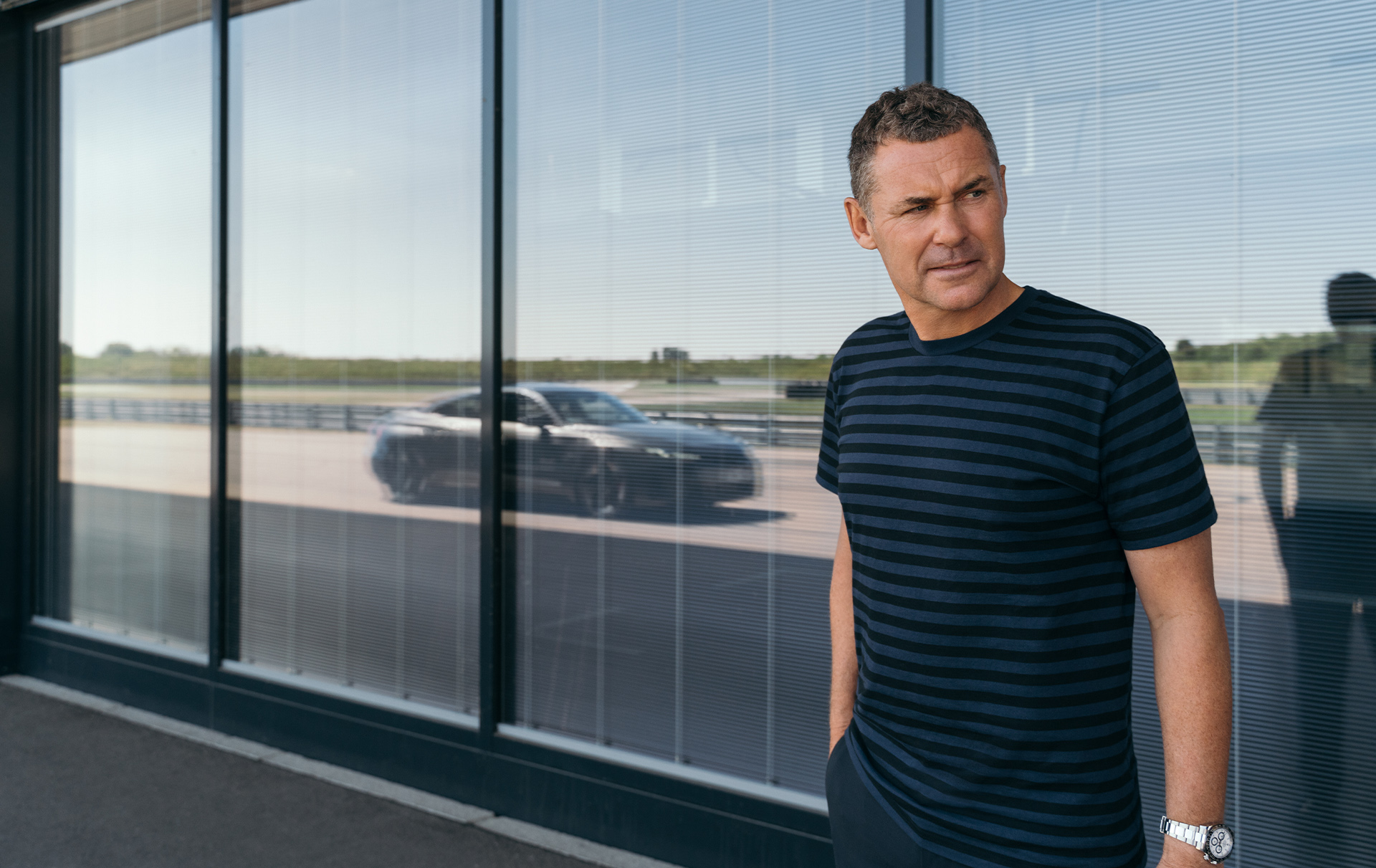 Portrait of Tom Kristensen in front of a building in Neuburg an der Donau.